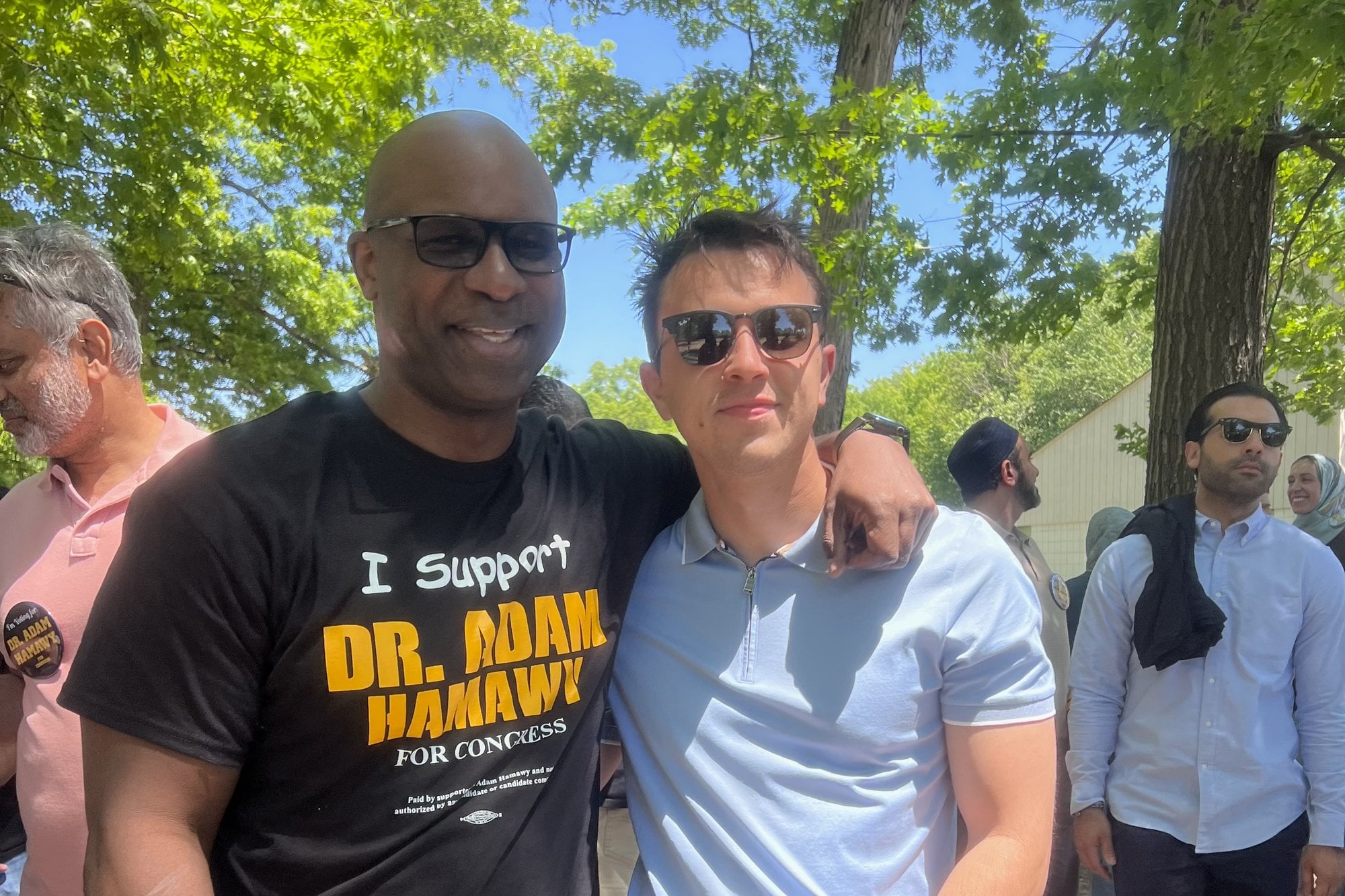 Adam Rueda connecting with a constituent at a community event in NJ-5